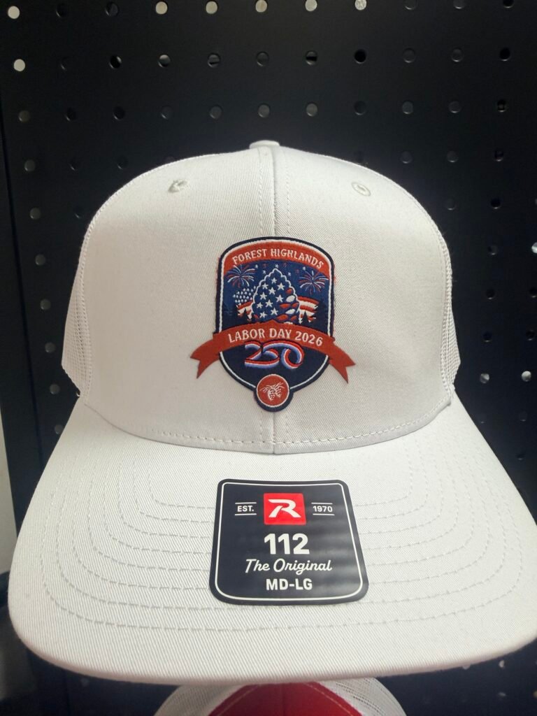 White Richardson 112 trucker cap with a custom embroidered shield patch, decorated in Phoenix Arizona